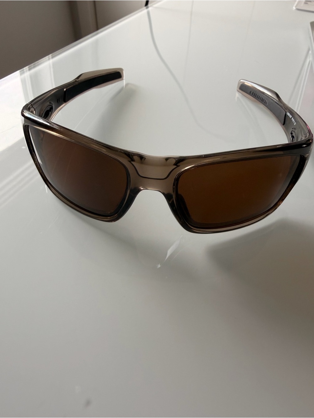 Brown women’s Oakley sunglasses